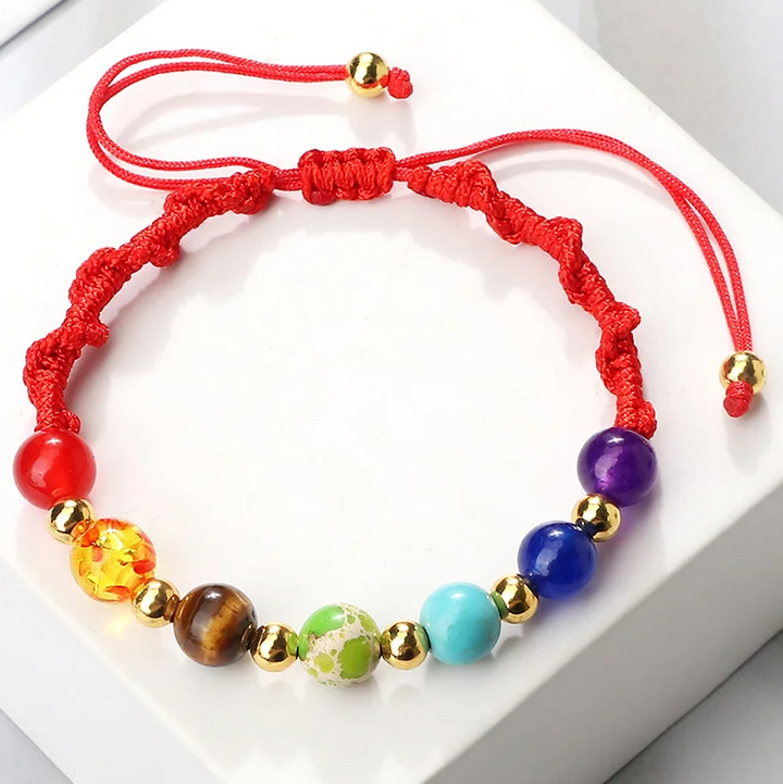 Armband aus sieben Chakren aus Naturstein mit Kupferperlen