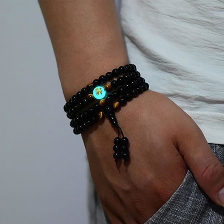 Buddhistisches mala armband mit fluoreszierendem drachensymbol - bracelet
