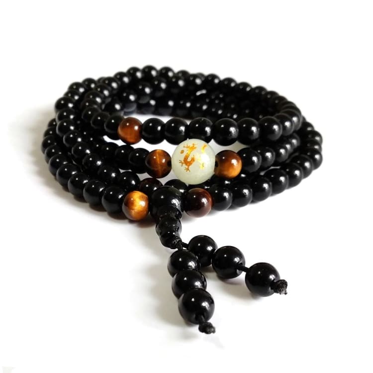 Buddhistisches mala armband mit fluoreszierendem drachensymbol - bracelet